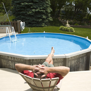 Relaxing by backyard pool
